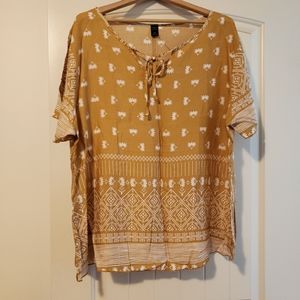3XL yellow shirt with white pattern.